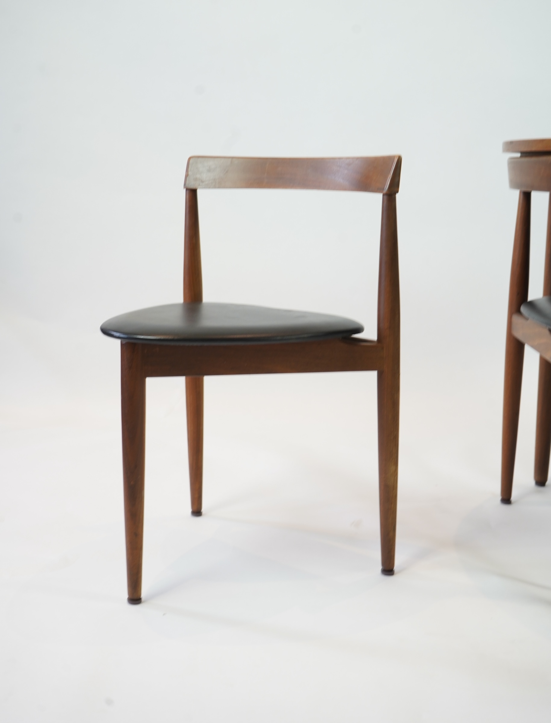 Hans Olsen (Danish, 1919–1992) for Frem Røjle: A Danish teak 'Roundette' extending dining table and four chairs